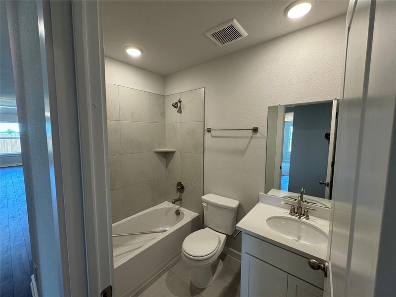 Bathroom with vanity and shower / washtub combination Bathroom with vanity and shower / washtub combination