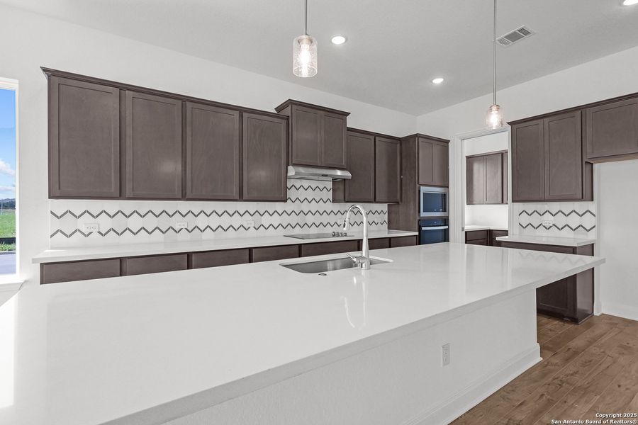 Furnished interior view inside a new home in Megan's Landing, Castroville (Image 10).