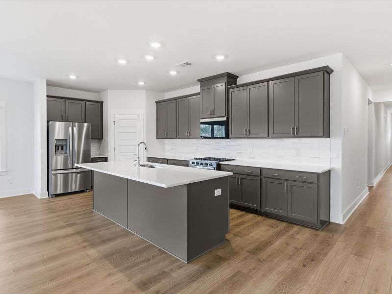 Furnished interior view inside a new home in The Coves at Lakes of Cane Bay, Summerville (Image 10).