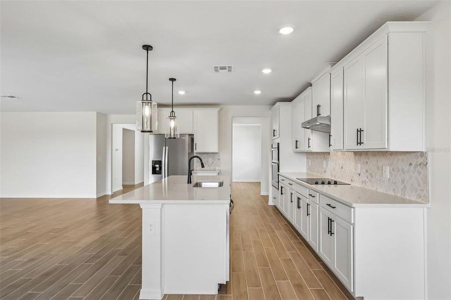 Furnished interior view inside a new home in The Grove at Stuart Crossing - Signature Series, Bartow (Image 9).