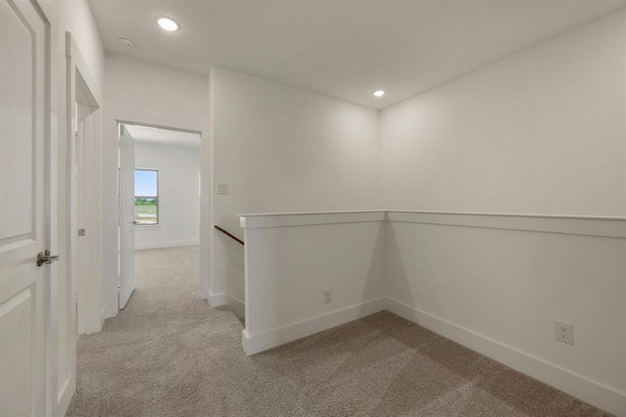The loft at the top of the stairs makes a perfect pocket office or reading nook. The loft at the top of the stairs makes a perfect pocket office or reading nook.