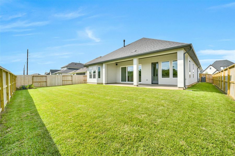 Exterior details and patio area of a home in Sienna 65', Missouri City (Image 28).