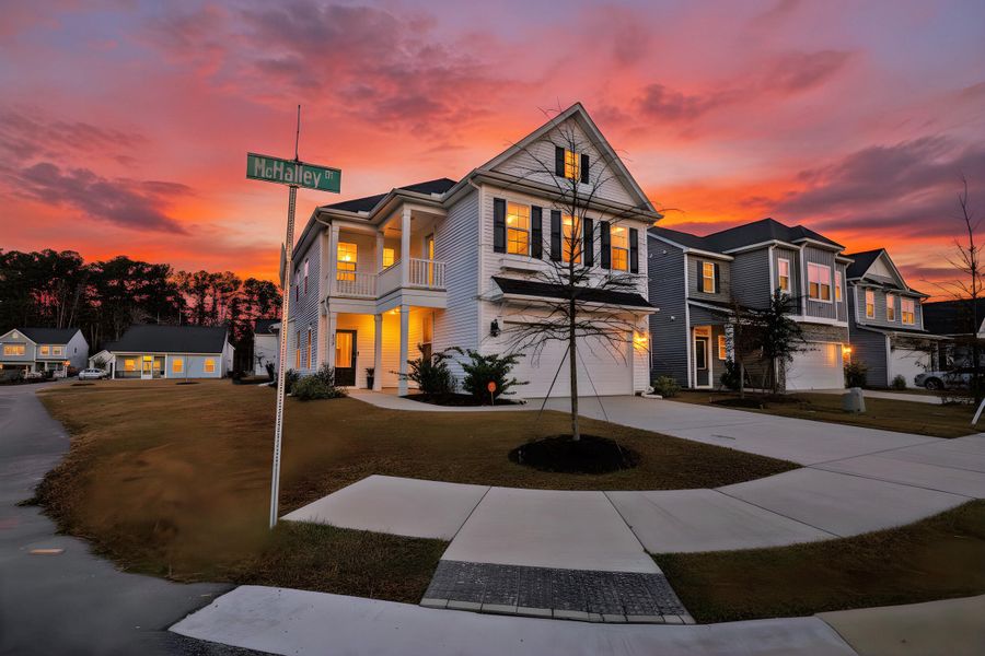 Front exterior of a new home in Six Oaks, Summerville, SC, highlighting curb appeal (Image 25). Front exterior of a new home in Six Oaks, Summerville, SC, highlighting curb appeal (Image 25).