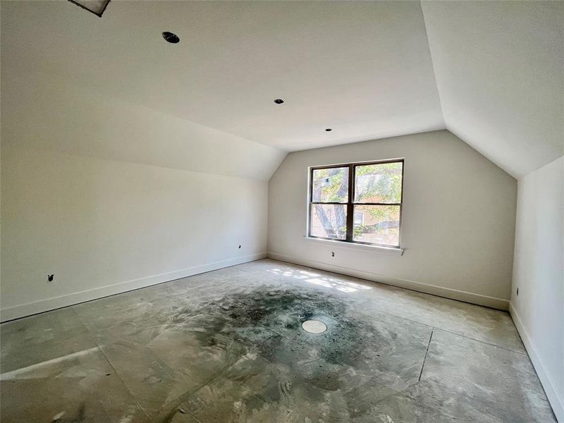 Bonus room featuring vaulted ceiling