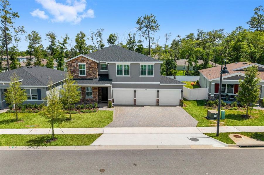 Front exterior of a new home in , Deland, FL, highlighting curb appeal (Image 31).