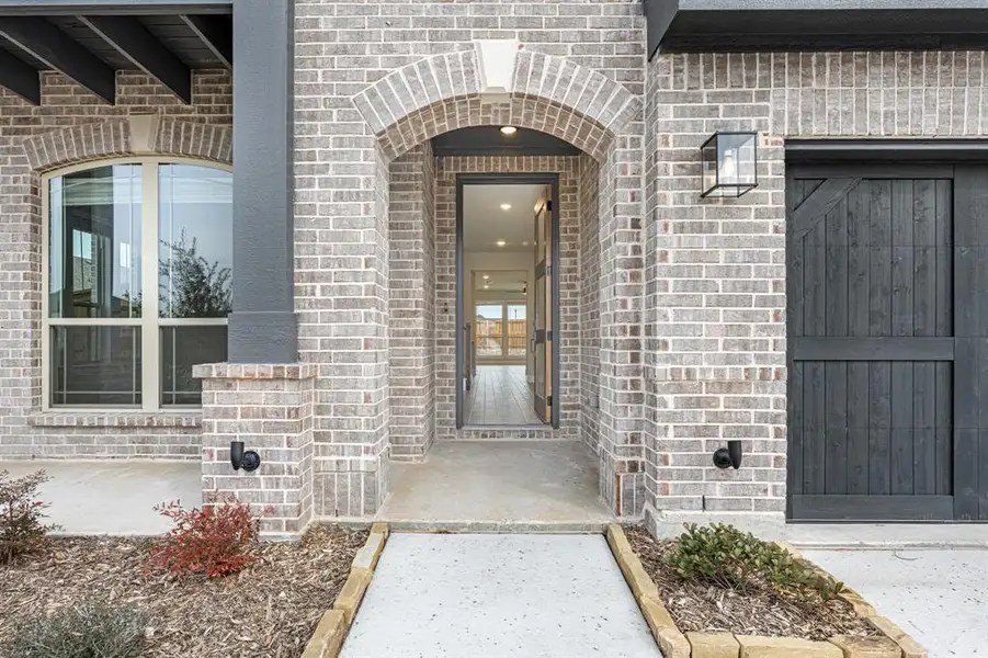 Exterior details and patio area of a home in Sonoma Verde, McLendon-Chisholm (Image 3).