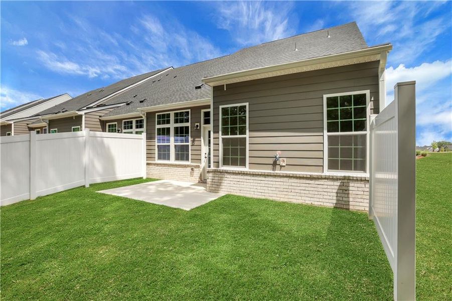 Exterior details and patio area of a home in Newberry 55+, McDonough (Image 2).
