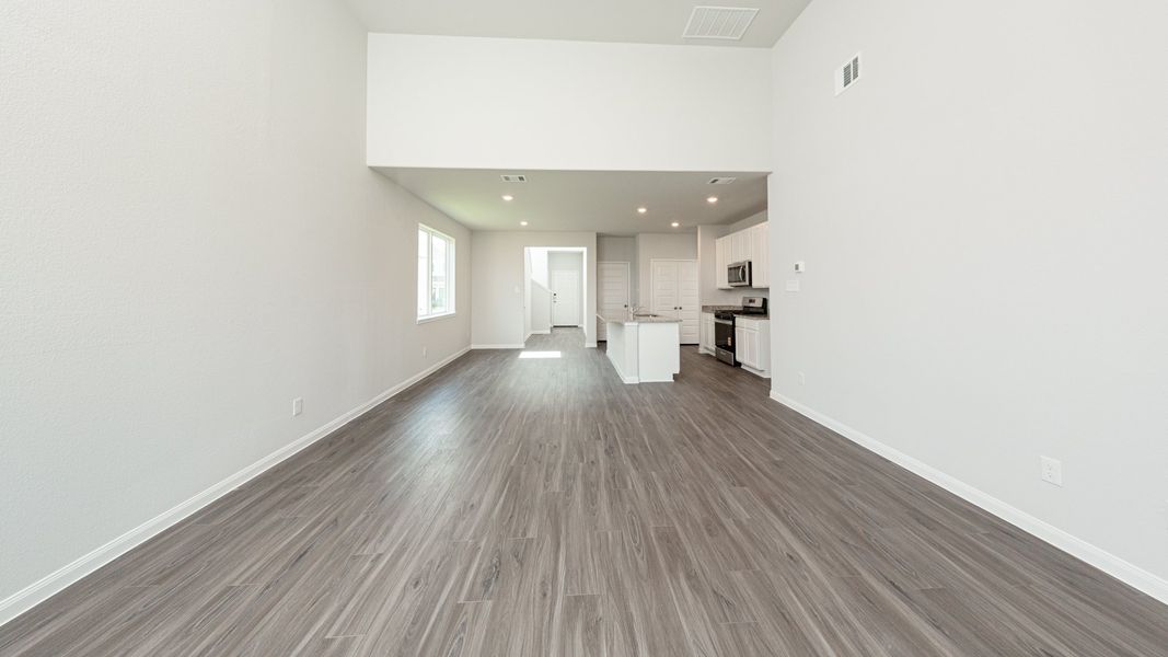 Family Room to Dining Area and Kitchen Family Room to Dining Area and Kitchen