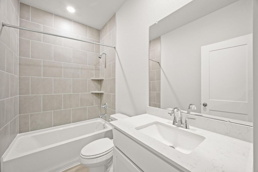 Furnished interior view inside a new home in Sunterra, Katy (Image 8).