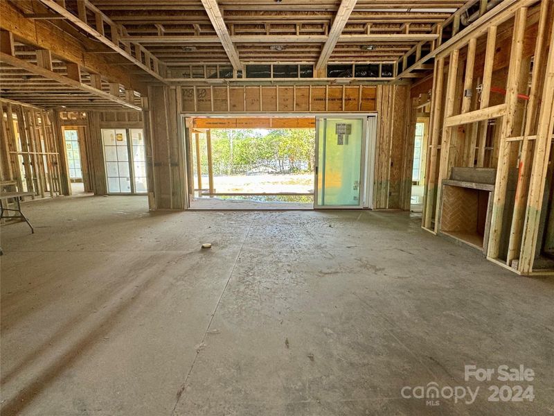 View from foyer into family room & outdoor living space