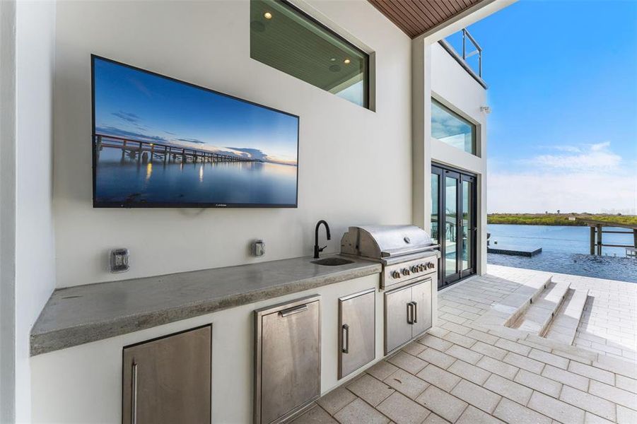 Exterior details and patio area of a home in , New Smyrna Beach (Image 32).