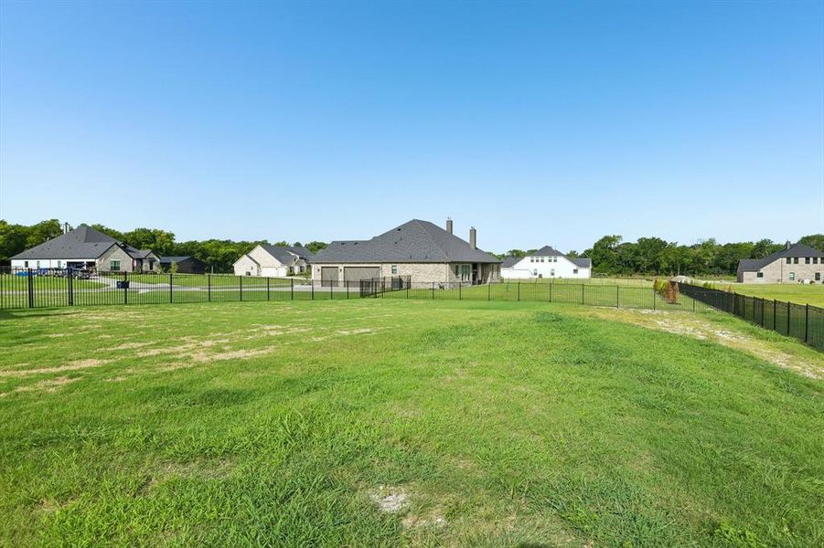 Exterior details and patio area of a home in King Crossing Estates, Van Alstyne (Image 24). Exterior details and patio area of a home in King Crossing Estates, Van Alstyne (Image 24).