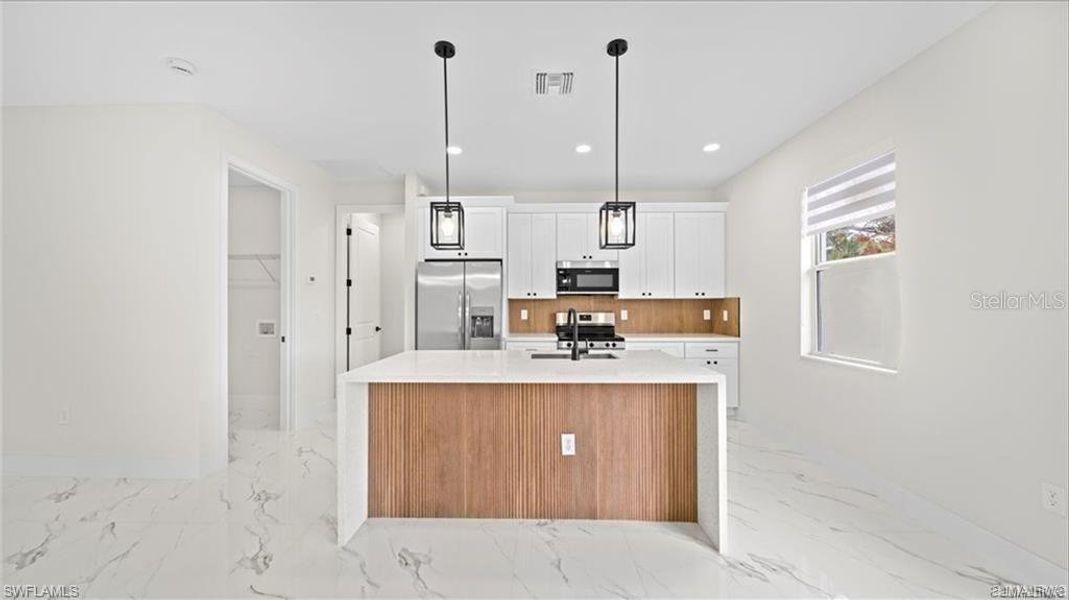 Furnished interior view inside a new home in , Lehigh Acres (Image 10).