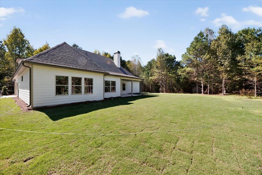 Exterior details and patio area of a home in White Oaks, The Rock (Image 22).