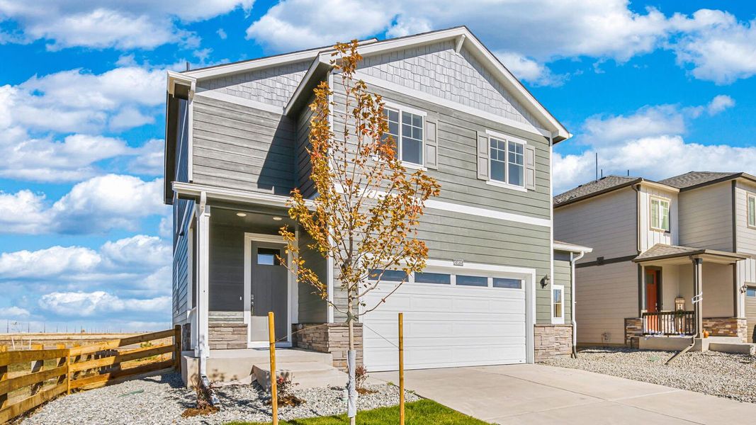 Front exterior of a new home in The Ridge at Lorson Ranch, Colorado Springs, CO, highlighting curb appeal (Image 2).