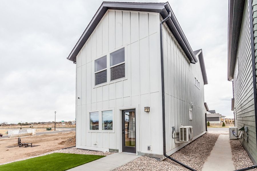 Representative exterior details of a home built from the Magnolia by Hartford Homes in Prairie Song Cottages, Windsor (Image 3). Representative exterior details of a home built from the Magnolia by Hartford Homes in Prairie Song Cottages, Windsor (Image 3).