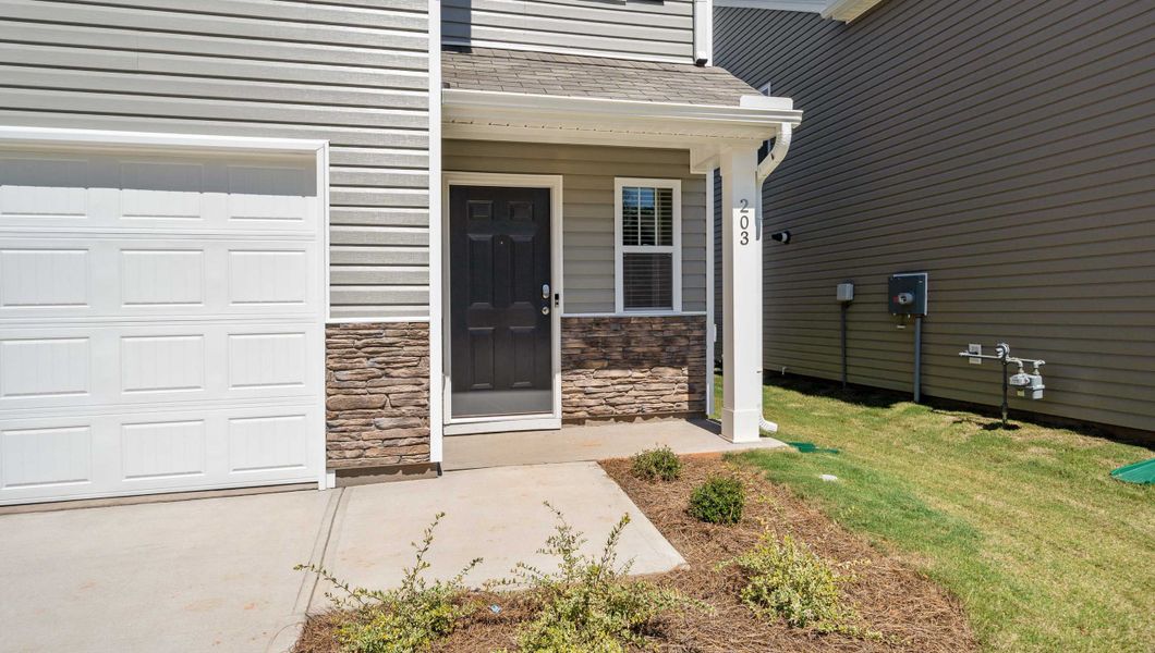 Front exterior of a new home in Baxter Village, Boiling Springs, SC, highlighting curb appeal (Image 2).