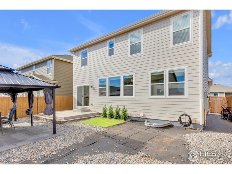 Exterior details and patio area of a home in , Lochbuie (Image 24).