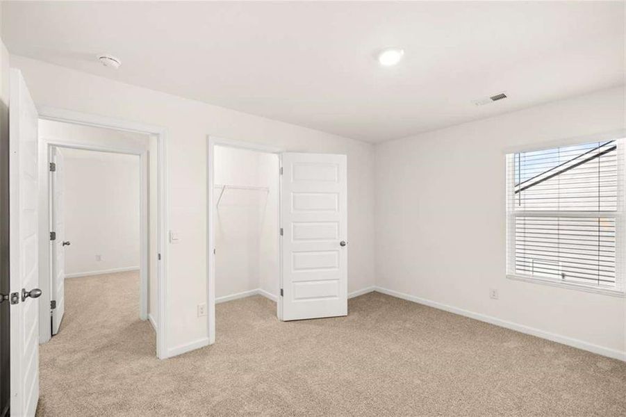 Spacious, unfurnished interior of a new home in Preserve at Dove Creek, Statham (Image 31).