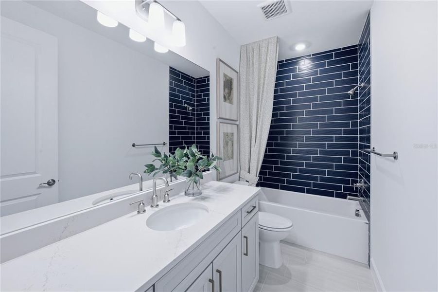 Furnished interior view inside a new home in Grandura, Sarasota (Image 11).