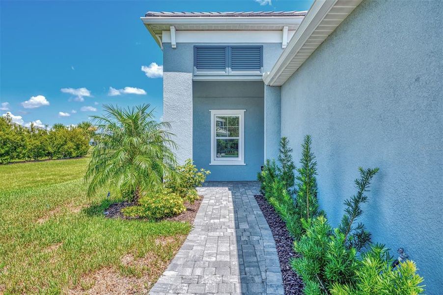 Exterior details and patio area of a home in , Sarasota (Image 21).