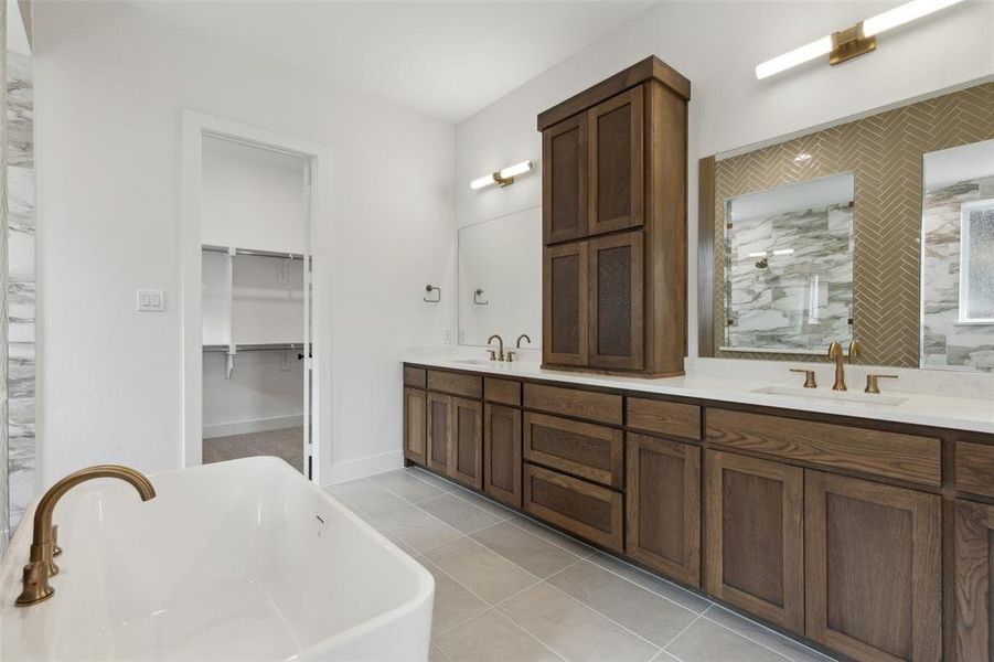 NO shortage of space or style in this gorgeous bath!