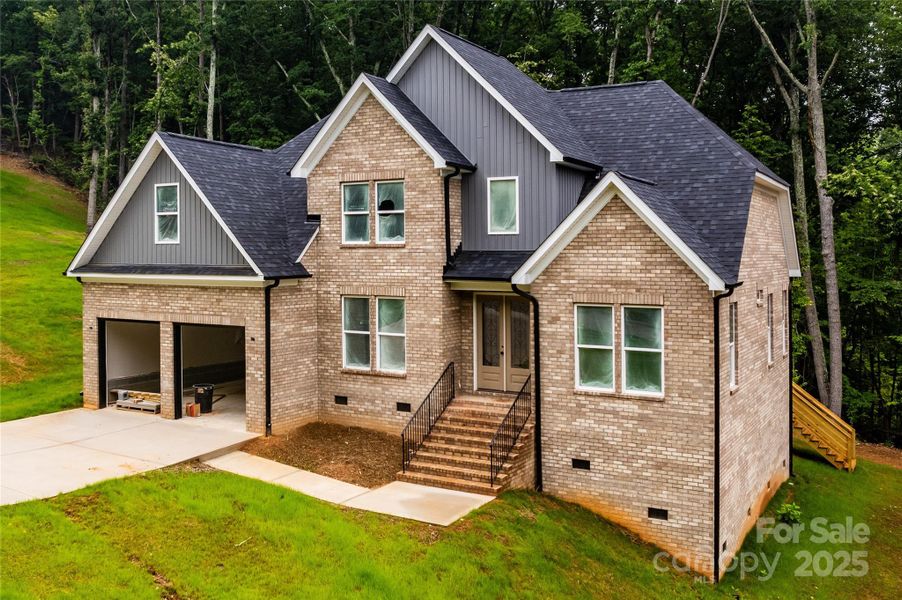 Front exterior of a new home in , Dallas, NC, highlighting curb appeal (Image 9). Front exterior of a new home in , Dallas, NC, highlighting curb appeal (Image 9).