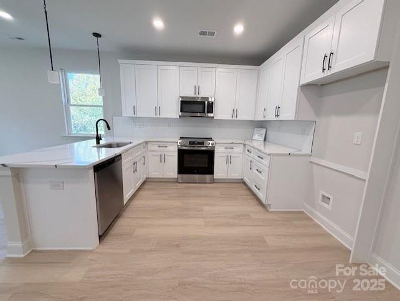Furnished interior view inside a new home in , Gastonia (Image 26).