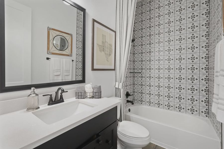 Representative furnished interior of a home built from the Oxford by Chesmar Homes in Attwater 55s, Waller (Image 15).