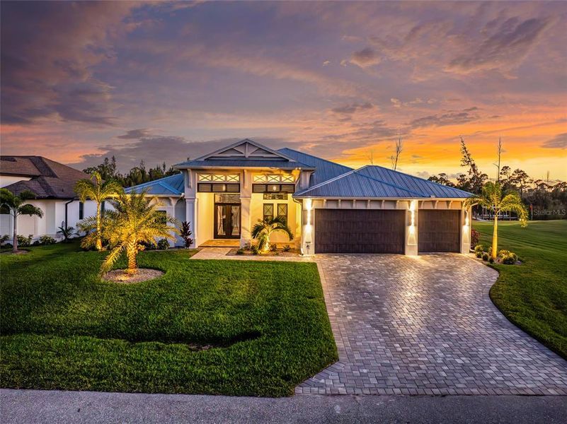 Front exterior of a new home in , Port Charlotte, FL, highlighting curb appeal (Image 2).