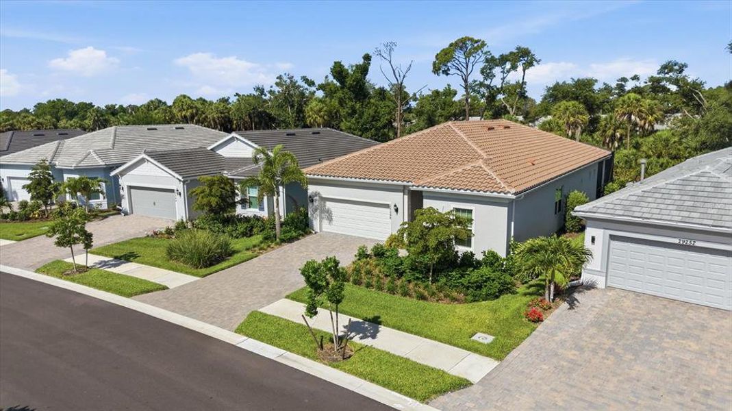 Front exterior of a new home in , Englewood, FL, highlighting curb appeal (Image 2). Front exterior of a new home in , Englewood, FL, highlighting curb appeal (Image 2).