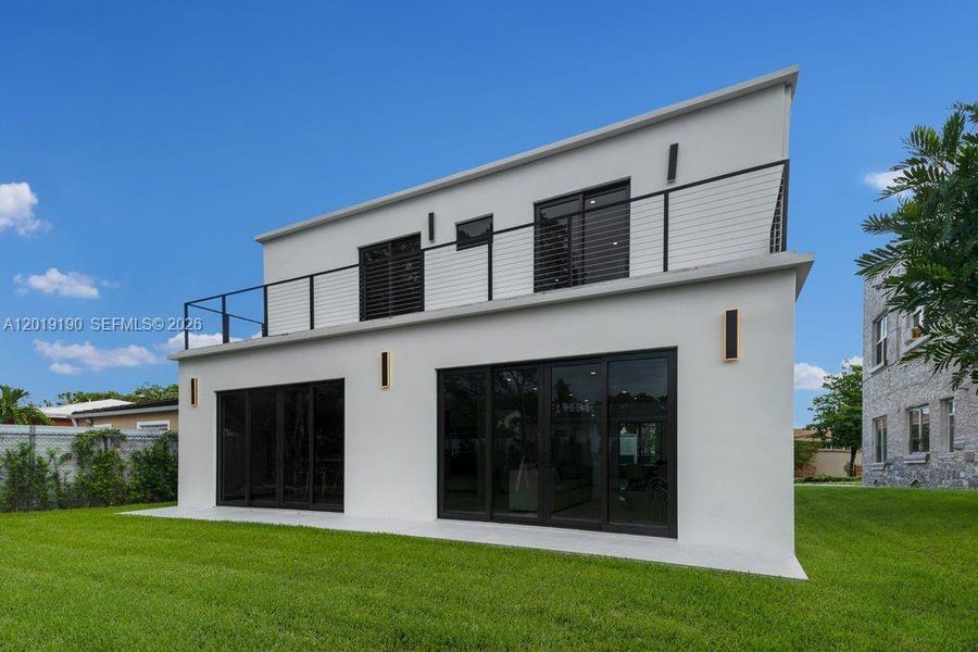 Exterior details and patio area of a home in , Miami (Image 3).