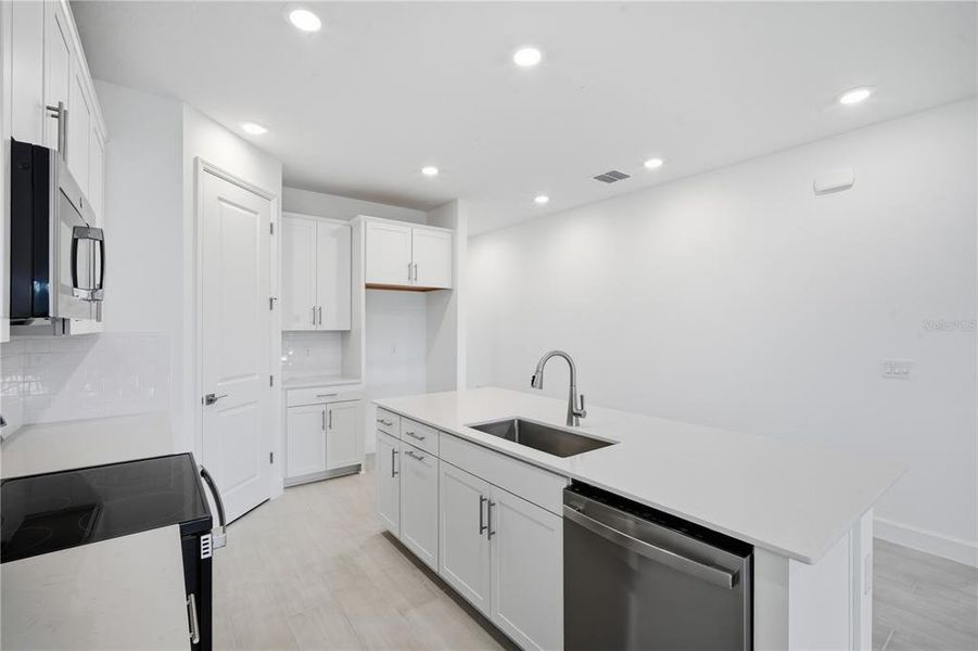 Furnished interior view inside a new home in Glen Lakes, Weeki Wachee (Image 7).