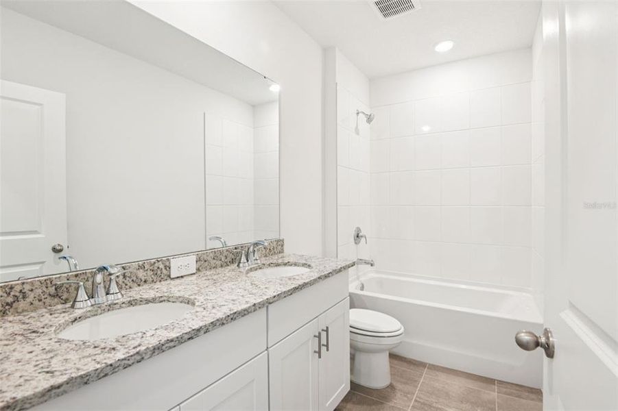 Furnished interior view inside a new home in Two Rivers - Classic Series, Zephyrhills (Image 6).