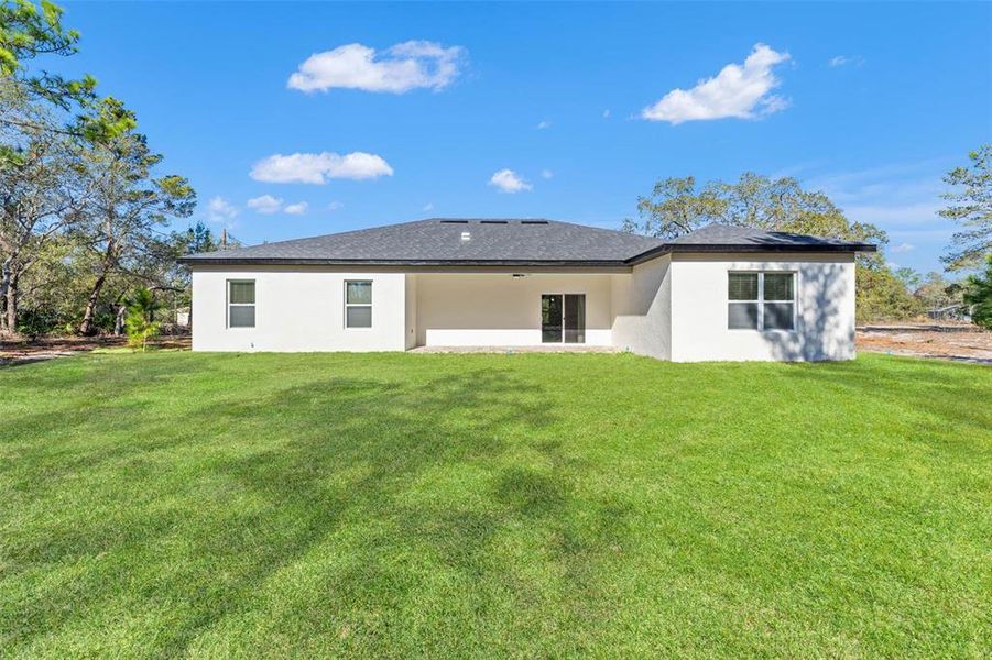 Exterior details and patio area of a home in , Brooksville (Image 32).
