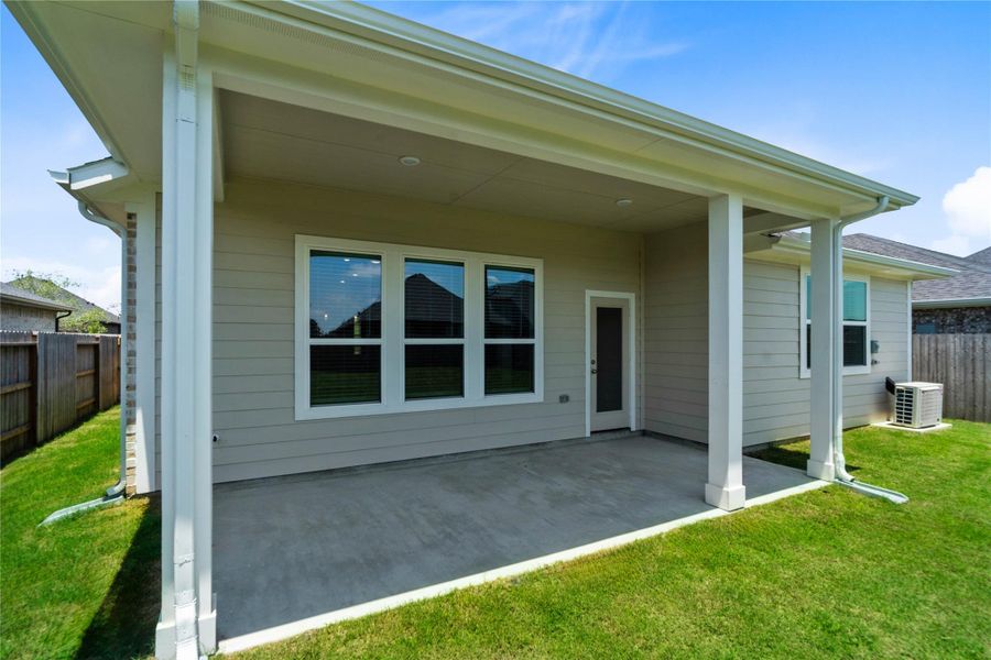 Exterior details and patio area of a home in Sorella, Tomball (Image 18).