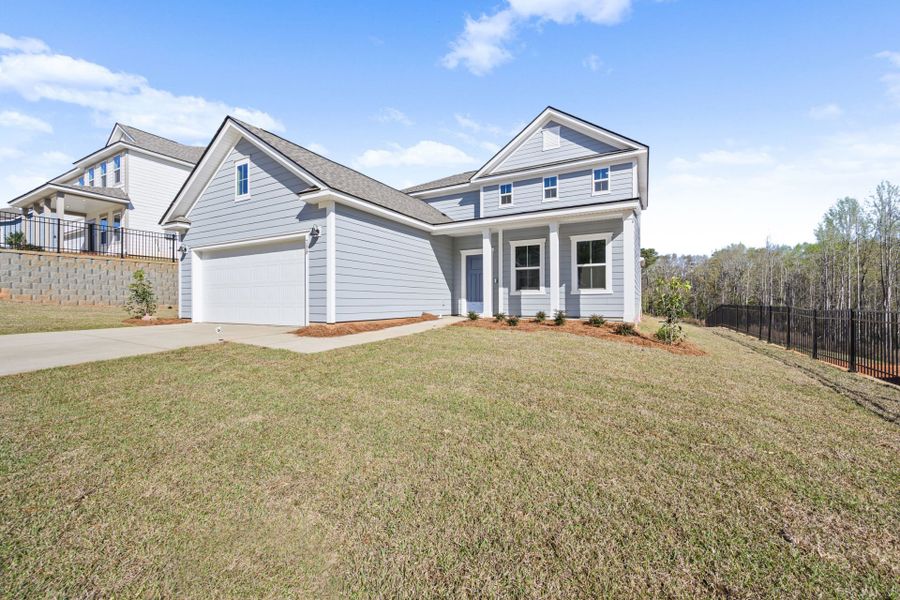 Front exterior of a new home in Carriage Estates, Lexington, SC, highlighting curb appeal (Image 25).