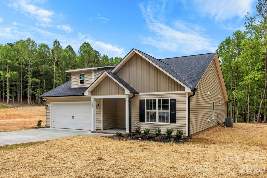 Front exterior of a new home in , Albemarle, NC, highlighting curb appeal (Image 22).