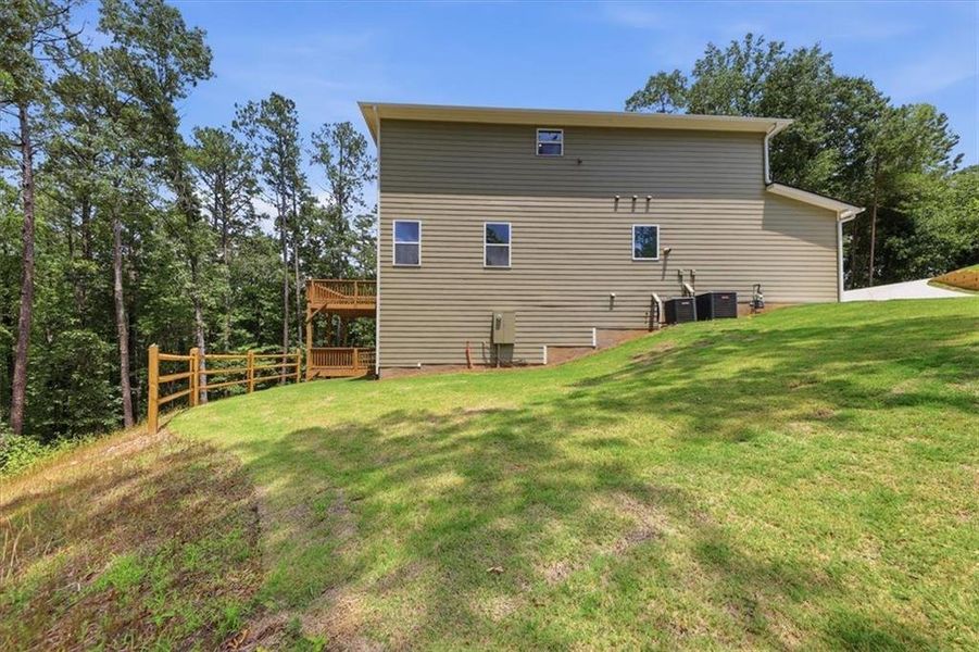 Exterior details and patio area of a home in Tuscany Hills, Douglasville (Image 26).
