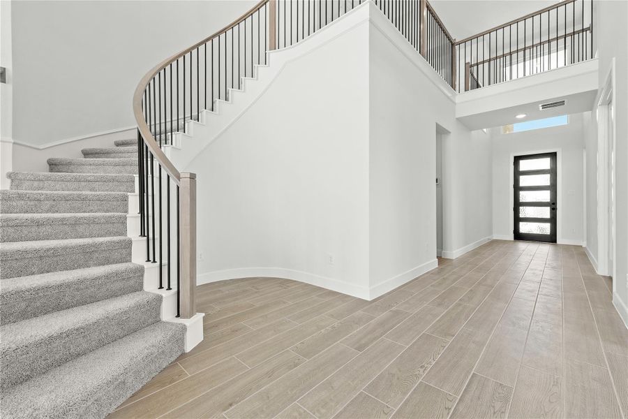 Spacious, unfurnished interior of a new home in Sunterra, Katy (Image 13). Spacious, unfurnished interior of a new home in Sunterra, Katy (Image 13).