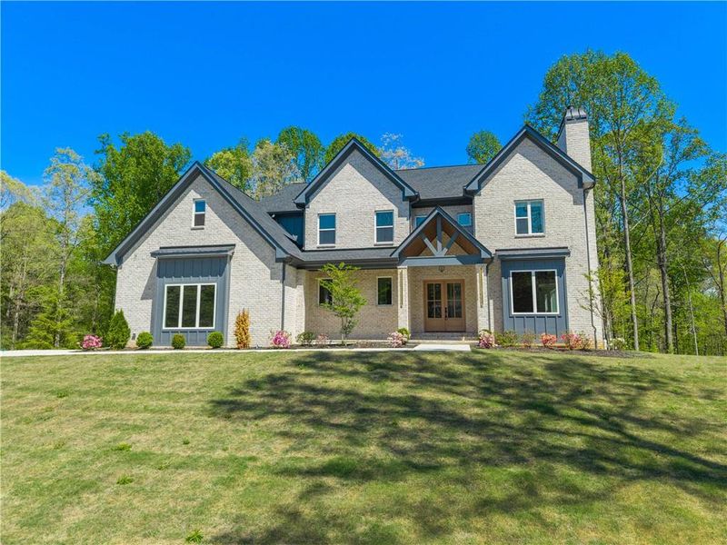Front exterior of a new home in , Hoschton, GA, highlighting curb appeal (Image 29).