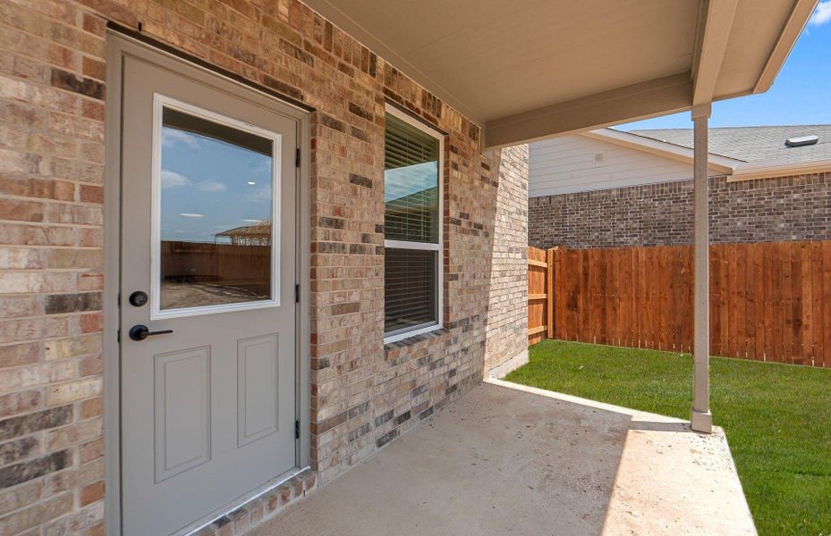 Exterior details and patio area of a home in Lagos, Manor (Image 3). Exterior details and patio area of a home in Lagos, Manor (Image 3).