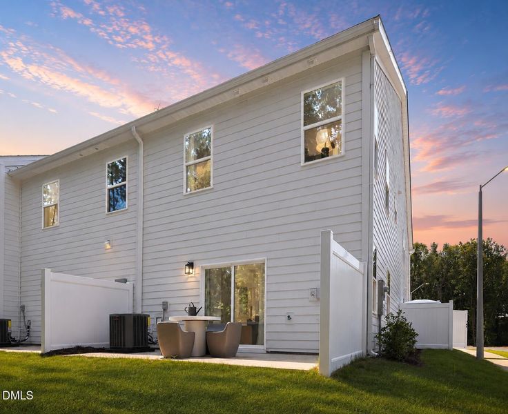 Exterior details and patio area of a home in The Knoll at White Oak, Garner (Image 3).