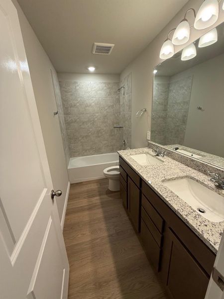 Furnished interior view inside a new home in Southern Pointe, College Station (Image 6).