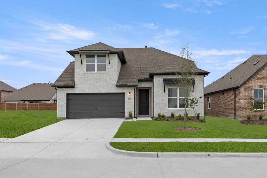 Representative exterior photo of a completed home built from the Honor by Rockwell Homes in Creekside, Royse City, TX (Image 33).