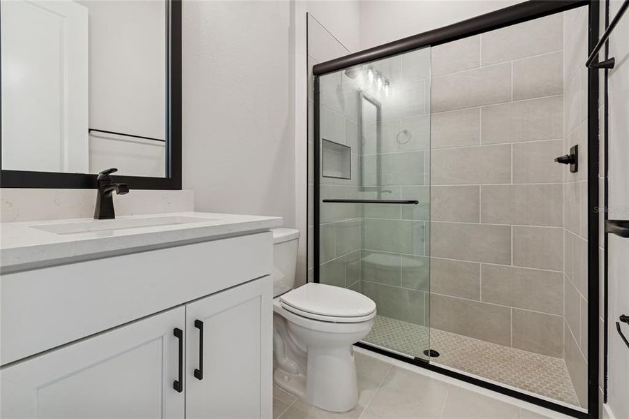 Furnished interior view inside a new home in Emerald Landing at Waterside at Lakewood Ranch – Cottage Series, Sarasota (Image 11).