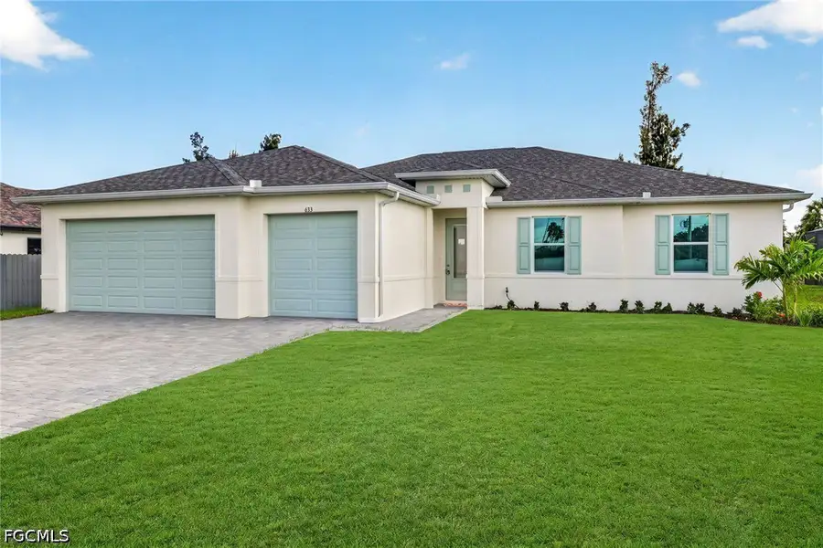 Front exterior of a new home in Cape Coral, Cape Coral, FL, highlighting curb appeal (Image 2). Front exterior of a new home in Cape Coral, Cape Coral, FL, highlighting curb appeal (Image 2).