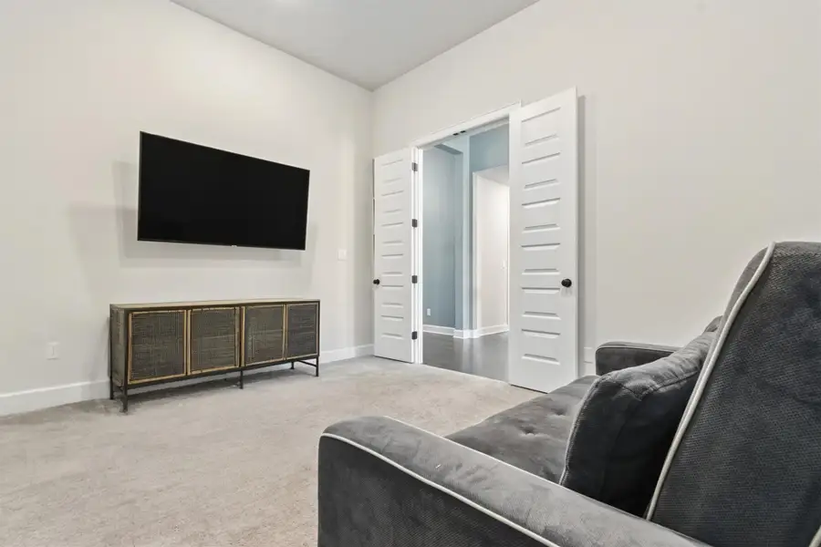 Media Room/Office with double door entry Media Room/Office with double door entry