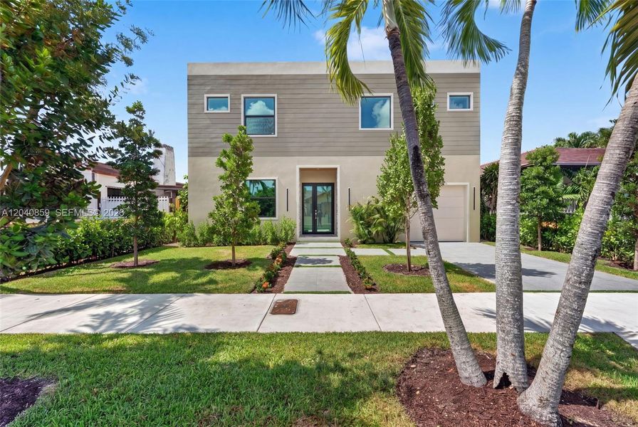 Front exterior of a new home in , Miami, FL, highlighting curb appeal (Image 23). Front exterior of a new home in , Miami, FL, highlighting curb appeal (Image 23).
