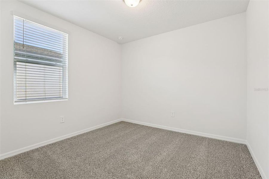 Spacious, unfurnished interior of a new home in Lawson Dunes - Signature Series, Haines City (Image 30).